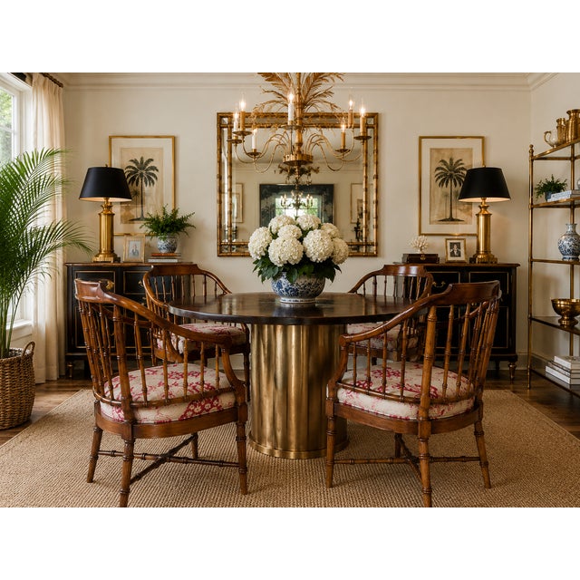 A beautiful set of four vintage Drexel dining chairs featuring carved faux bamboo frames in a wood finish. Designed in the...