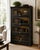 A dramatic reimagining of the classic early-20th-century barrister bookcase, this four-section architectural cabinet has...