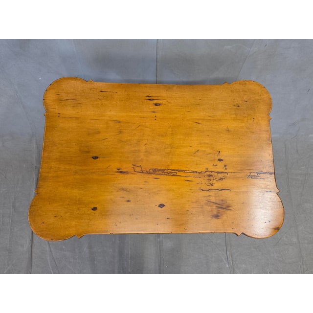 A charming antique Queen Anne style porringer-top beechwood tea table likely from New England. The old beechwood...