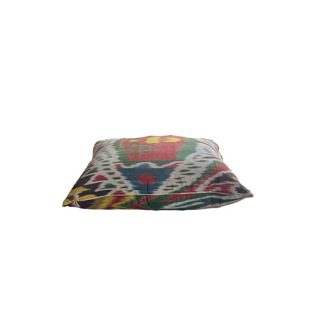 This beautiful silk vintage ikat pillow is a perfect statement piece bringing color, texture, and cultural artistry to any...