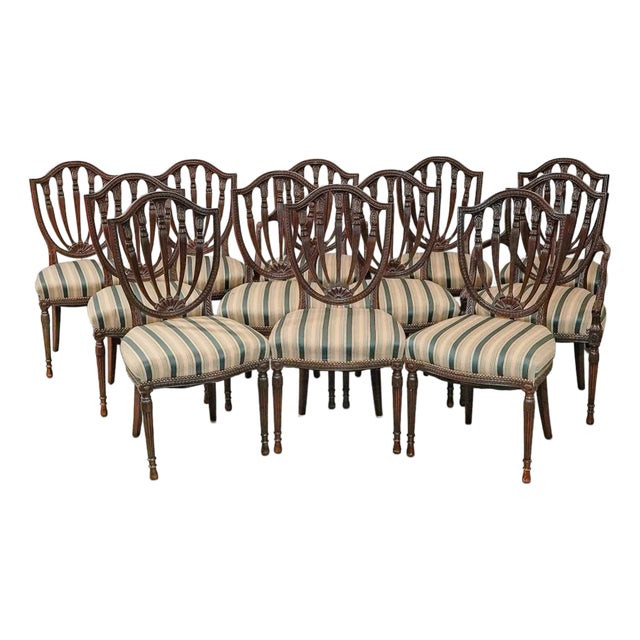 Early 20th Century Set of 12 English Mahogany Hepplewhite Style Carved Back Dining Chairs For Sale