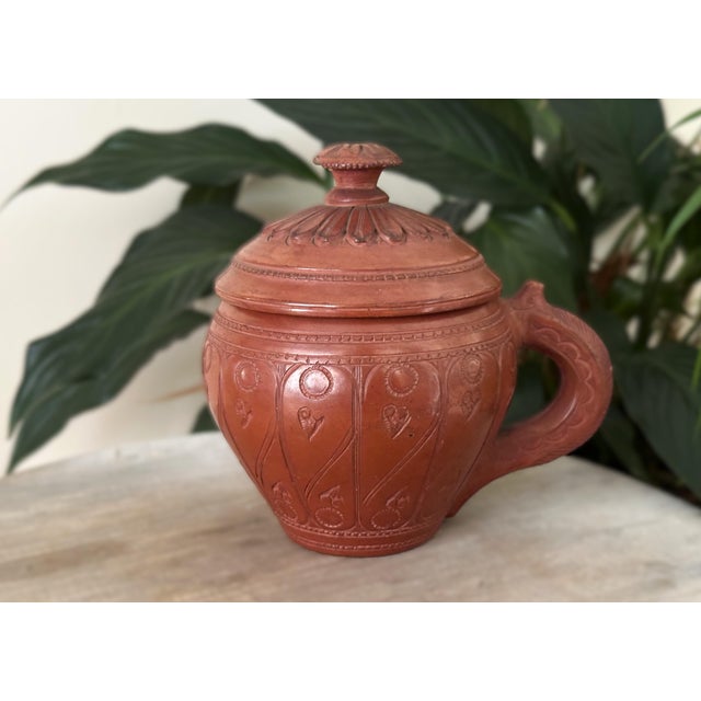 A rare 19th-century Ottoman Empire lidded terracotta vessel, hand-crafted in the historic Tophane district of Istanbul....