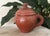 A rare 19th-century Ottoman Empire lidded terracotta vessel, hand-crafted in the historic Tophane district of Istanbul....