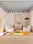 Boujad Rug | Handwoven Berber Wool Rug with Sunset Field and Totemic Figure This striking Boujad rug features a dramatic...