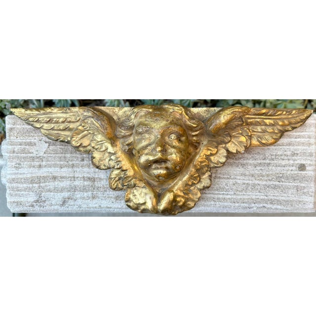 18th Century Italian Carved Giltwood Baroque Winged Angel Cherub This exquisite 18th-century Italian carved wood angel...