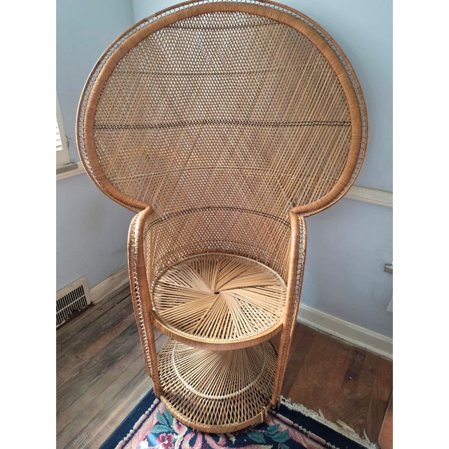 Lovely wicker Raton high fan back chair great as an accent 55 inches tall by 37 inches wide and the seat is 20 inches