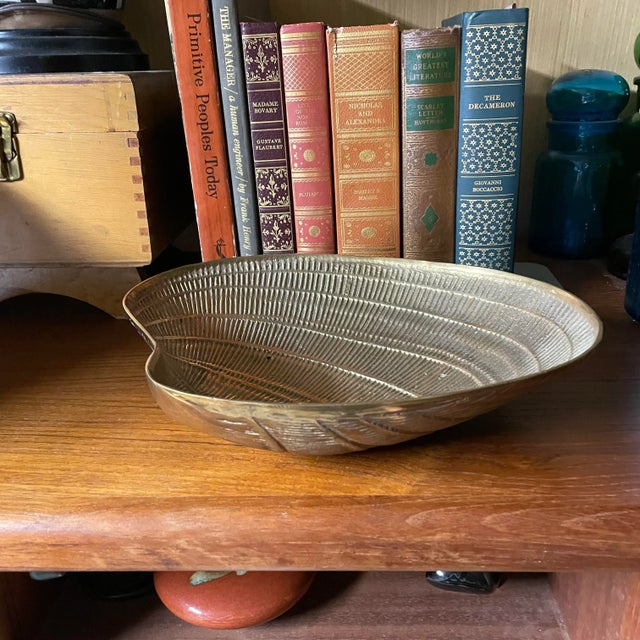 Large brass clamshell catch all. The pair of dice is for scale. The piece has not been polished so it’s got a great time-...