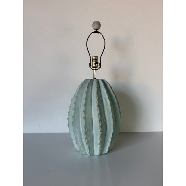 Bring bold Southwestern character to your space with this vintage Alsy Barrel Cactus table lamp from the 1980s. Crafted...