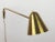 Adjustable brass wall lamp created by Jacques Biny in the 1950s for Luminalite. Can form a set with a double lamp that we...