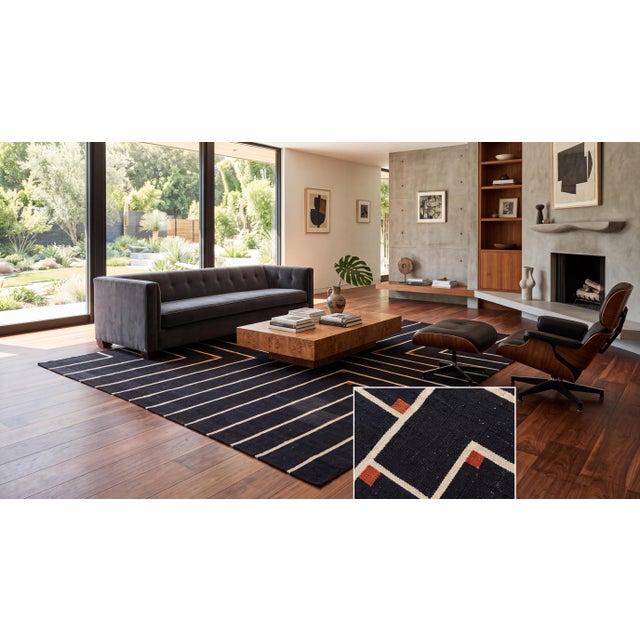 Elevate your space with this striking contemporary hand-woven wool Kilim rug, designed with a bold, graphic aesthetic...