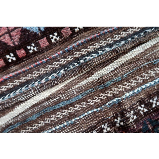 Handmade antique Afghan Baluch saddle bag in original condition, it has some age wear. The bag has been made in the...