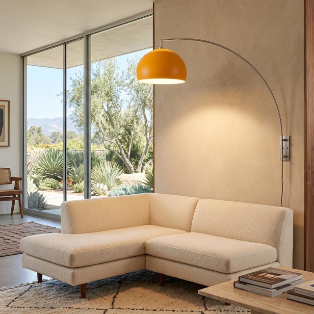 The Half Dome Wall Mounted Arc Lamp is a Modern wall-mounted arc lamp with a satin nickel steel frame, designed by Peter...