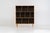 Oak bookcase by Kurt Østervig (Denmark, 1960s). A minimalistic bookcase crated in oak with vertical adjustable shelves and...