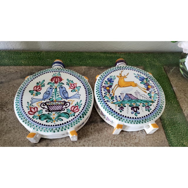 The items shown are Slovenská Keramika Modra (SKM) folk ceramic flasks, commonly known as a čutora (a traditional ceramic...
