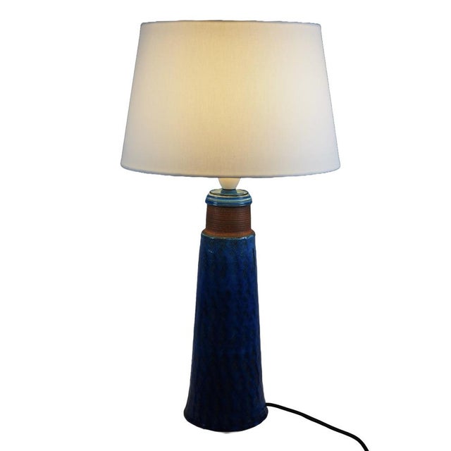 An exceptional and beautifully sculptural Danish table lamp designed by Nils Kähler (1906–1979) and produced by the...