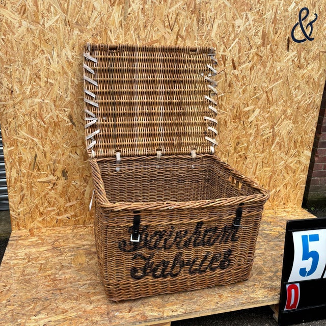 1920’s original english wicker baskets. Oversized industrial storage baskets retaining original faded branding. Handmade...