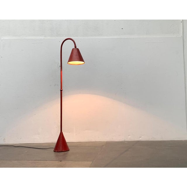 Rare mid century standing lamp from Valenti. This draft is often attributed to the French designer Jacques Adnet. But that...