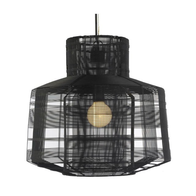 Handmade in the Philippines by Schema for Oggetti, the Busy Pendant Light makes a bold architectural statement....