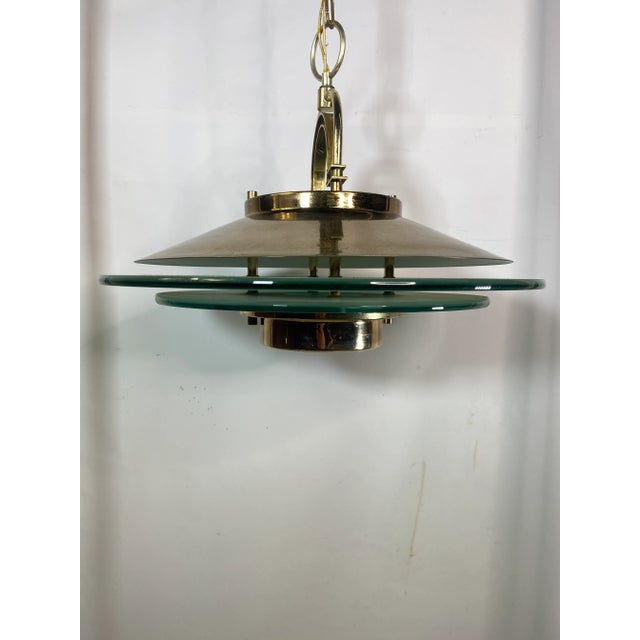 Great Style modern flying saucer style chandelier.It is complete except for typical brass ceiling cap.The light functions...