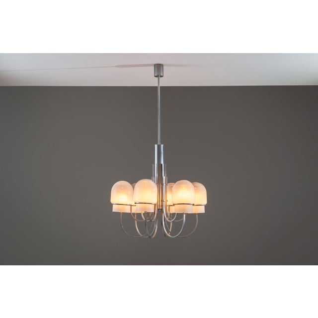 This rare chandelier by Angelo Gaetano Sciolari is a striking expression of refined Italian modernism, created during the...