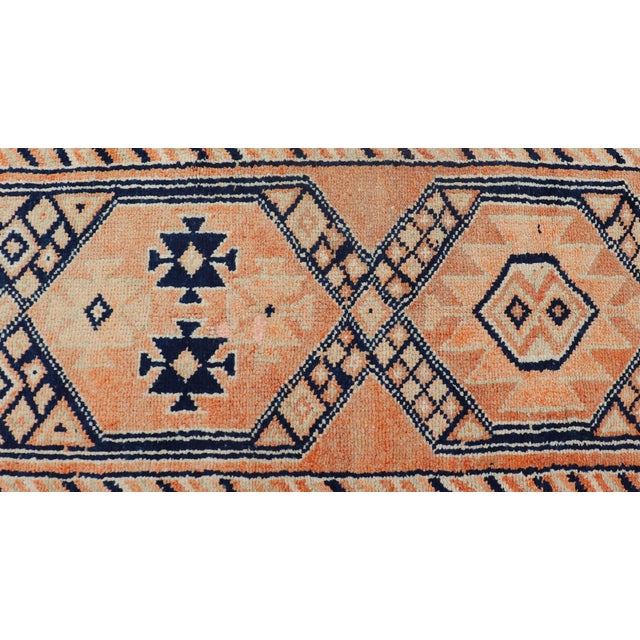 Mid 20th Century Tribal Medallion Design Vintage Turkish Runner in Orange and Navy Blue For Sale - Image 5 of 12