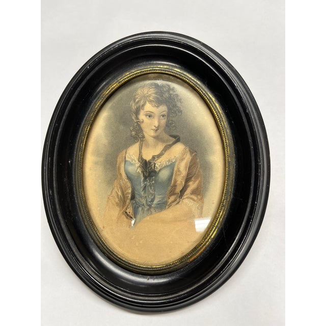 Lovely 19th century print, probably hand-colored, signed in the plate. Young woman with tones of pink, blue and white....