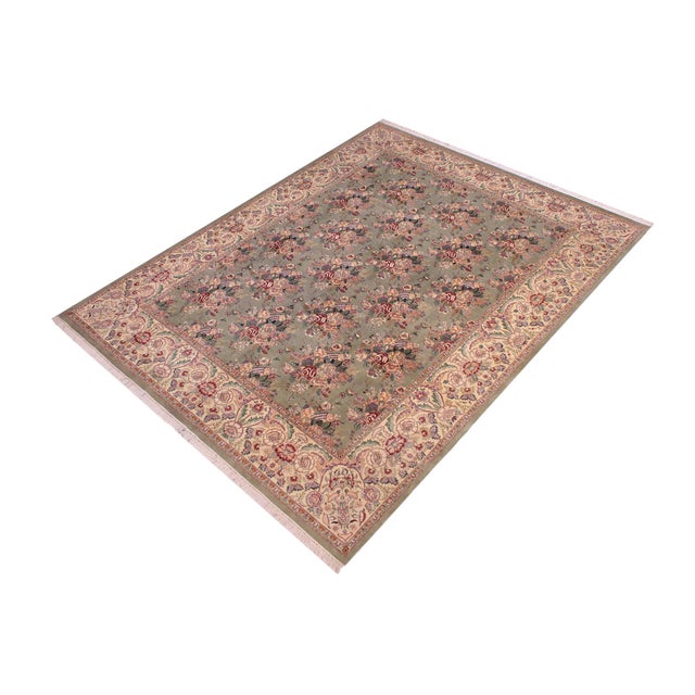 Designed with mesmerizing intricacy and gorgeous color palette, this hand-knotted masterpiece demonstrates the beauty and...