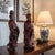 Hand-carved Chinese figural sculptures depicting Guanyin (Kwan Yin), the Buddhist Bodhisattva of mercy and compassion, and...