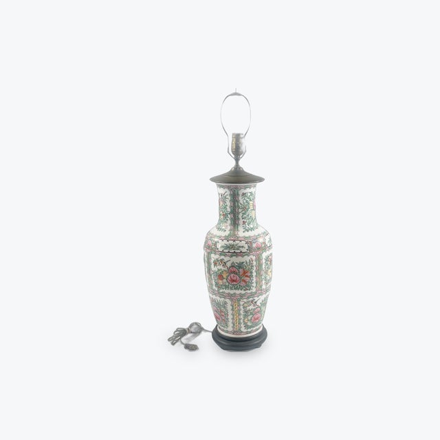 Large Famille Rose vase turned into lamp. Size: 20" tall to base of lamp and 8" in diameter Late 19th century vase.