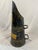 There's a wonderful graphic drama to this one: a black japanned coal helmet scuttle with gilt laurel swags, scrolling...
