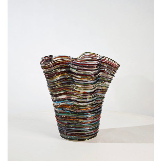 A stunning Murano glass vase, created by master glassmaker Enrico Cammozzo, features a distinctive multicolored "a fili"...
