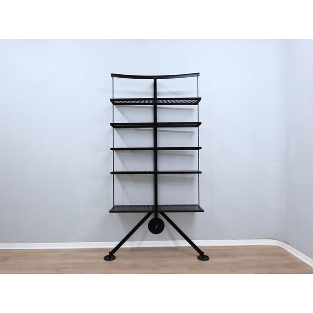 Embrace an icon that transcends mere furniture. The Ran bookshelf, a masterful creation by Carlo Forcolini for Alias in...