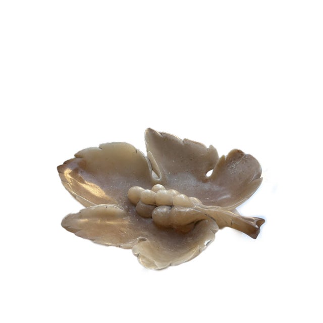 Alabaster Centerpiece with Grapes Elegant alabaster centerpiece, finely carved in the shape of a leaf with a central bunch...