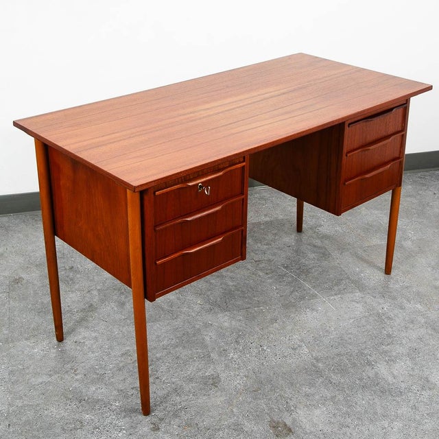 Teak office desk featuring 6 drawers. Top surface has been recently restored. The back is nicely finished so the desk can...