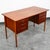 Teak office desk featuring 6 drawers. Top surface has been recently restored. The back is nicely finished so the desk can...
