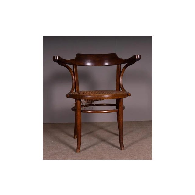 Thonet chair with round Vienna straw seat with empty backrest and armrests, straw seat. MeasuresHeight 75 cm Seat diameter...