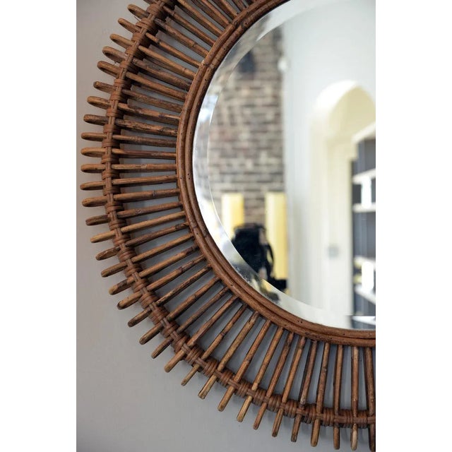 The ‘Oculus’ round rattan mirror with inserted flat mirror.