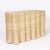 A pair of chic wicker drapery ghost consoles crafted with woven reed over a sturdy metal frame with the highest quality...