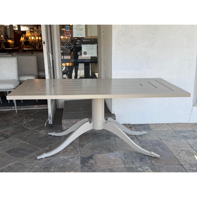 Design Plus Gallery presents the Outdoor Lipscomb Dining Table Base with Adams Style Top by McKinnon & Harris. The table...