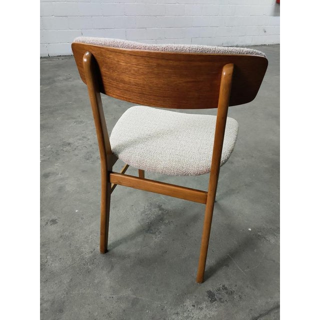 Chair from the manufacturer Farstrup made in Denmark with teak wood, 1970s, upholstered in white Boucle fabric....