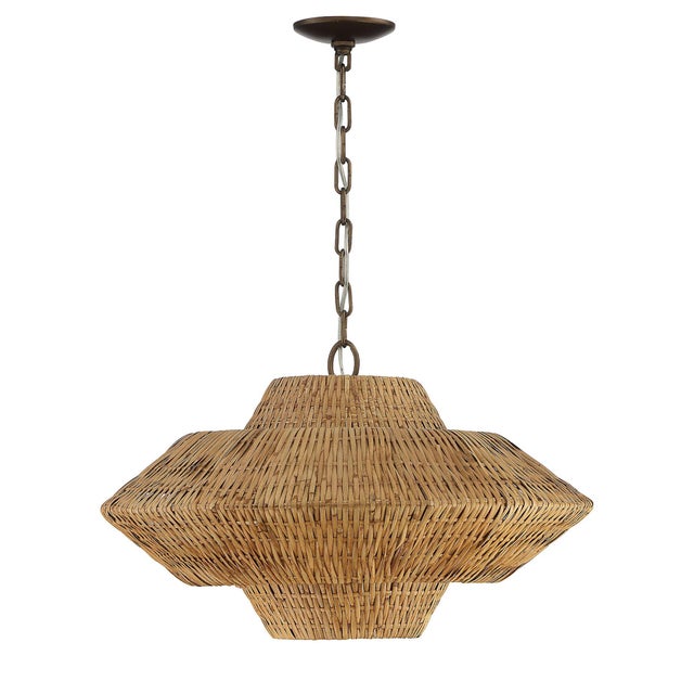 Rattan reeds are meticulously woven onto an iron frame to create the Luca 1-Light Rattan 3-Tier Chandelier. The natural...