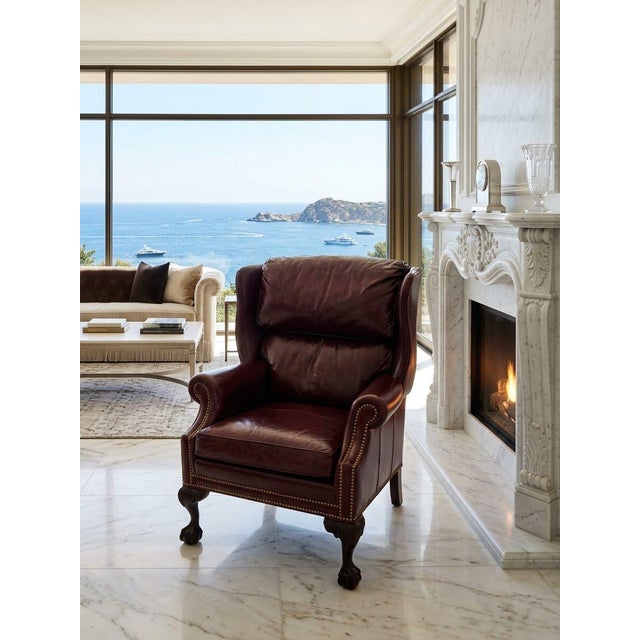 The Hancock and Moore Wingback Ball and Claw Leather Chair is a luxurious and stylish addition to any living room....