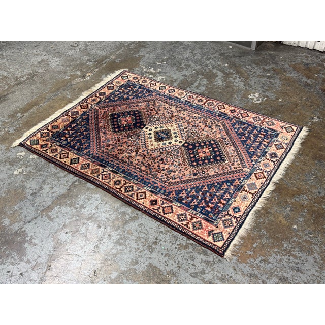 Design Plus Gallery presents a 3ft 5in × 4ft 7in Vintage Hand-Knotted Wool Geometric Area Rug. The rug displays a...