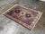 Design Plus Gallery presents a 3ft 5in × 4ft 7in Vintage Hand-Knotted Wool Geometric Area Rug. The rug displays a...