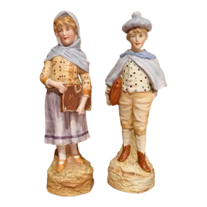 Pair of Early 20th Century German Bisque Figurines of Schoolchildren