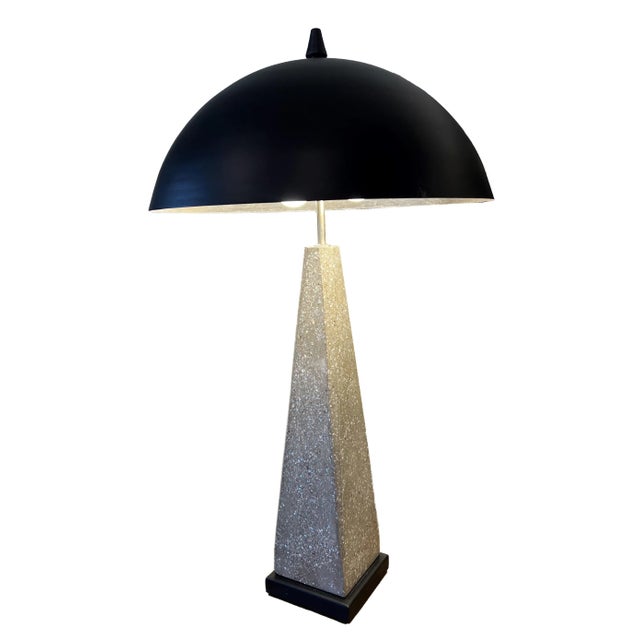 We call this "The Perfect Lamp" because it’s very transitional. Modern in design, it seems to work in most interior...