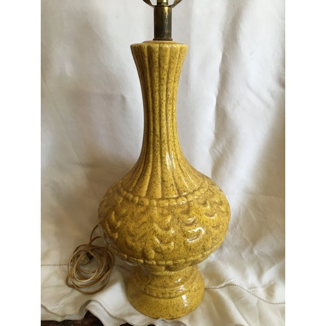 French mid-century modern ceramic lamp in Provence yellow. This pottery lamp is 17 inches tall and with the addition of a...