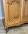 Vintage French Louis XVI Style Carved 4-Door Armoire For Sale - Image 6 of 13