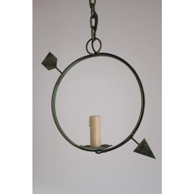 Charming Vintage Swedish metal pendant with arrow ornament in green. One light source in the middle of the circle with a...