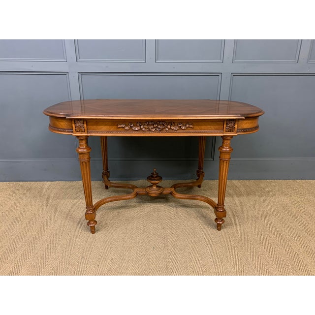 A lovely late 19th century French walnut centre table of generous proportions. Well constructed in solid walnut with...